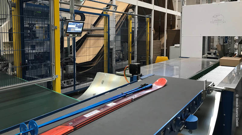 Packaging line for ski articles